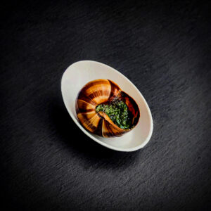 Weinbergschnecke in Kräuterbutter mit Estragon